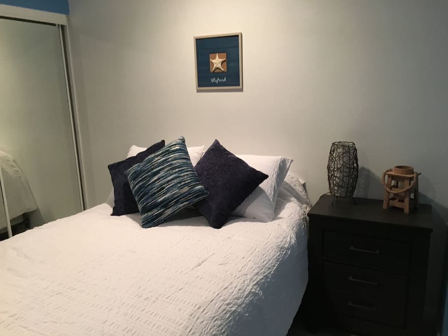 Full size bed with plush pillows!