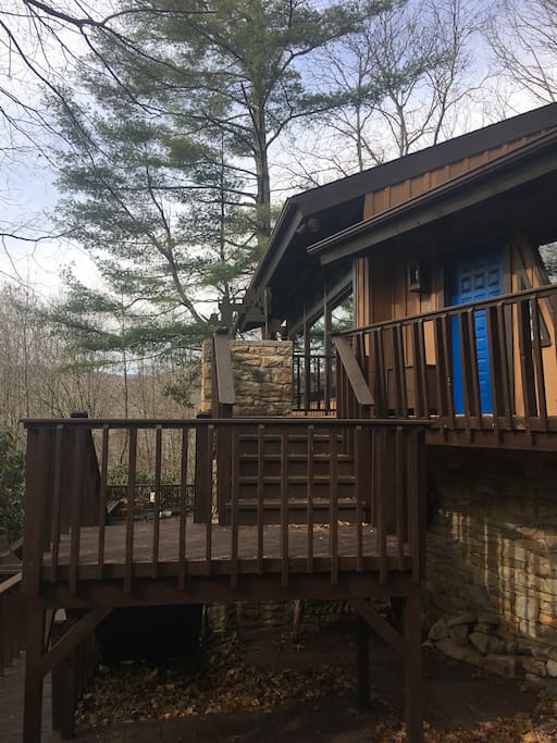 Front door, surrounded by decks on both levels