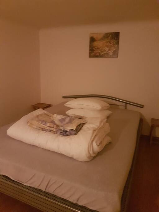 Bed in upper level of the bedroom