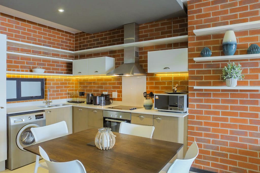 Kitchen includes dishwasher and washing machine, microwave, Nespresso machine, electric kettle, toaster etc.