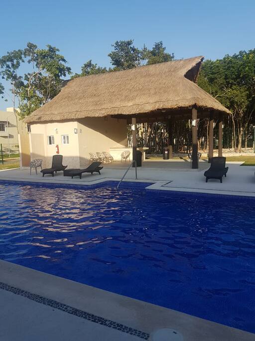 alberca con asador ,barra y palapa