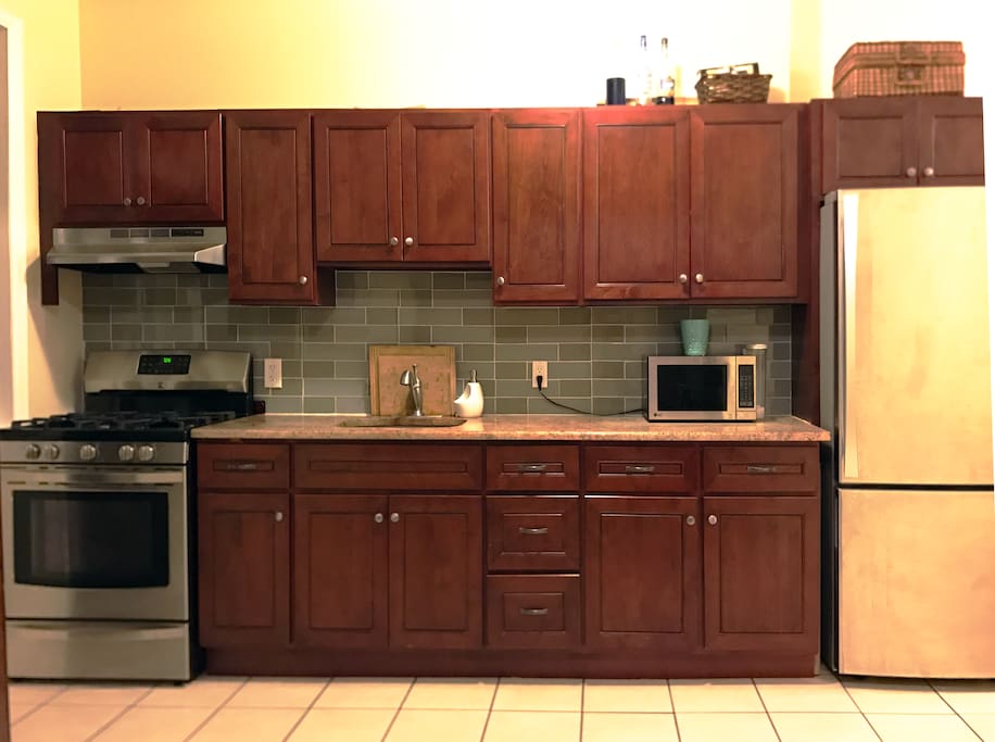 Comfortable sized kitchenette with state of the art appliances.