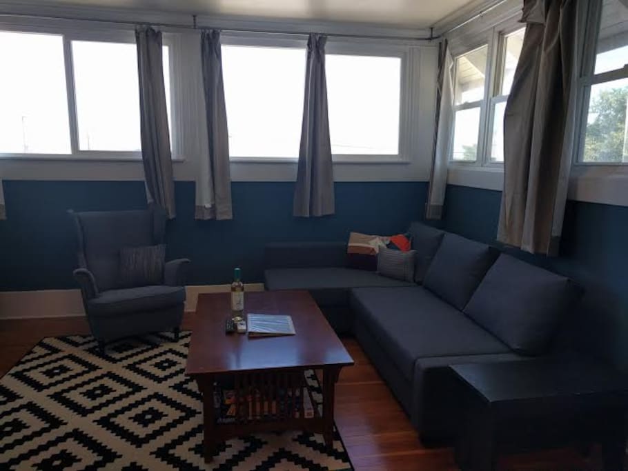 Shared living room with kitchenette.