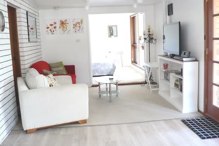 Cosy retreat among the trees.  300+ 5 star reviews