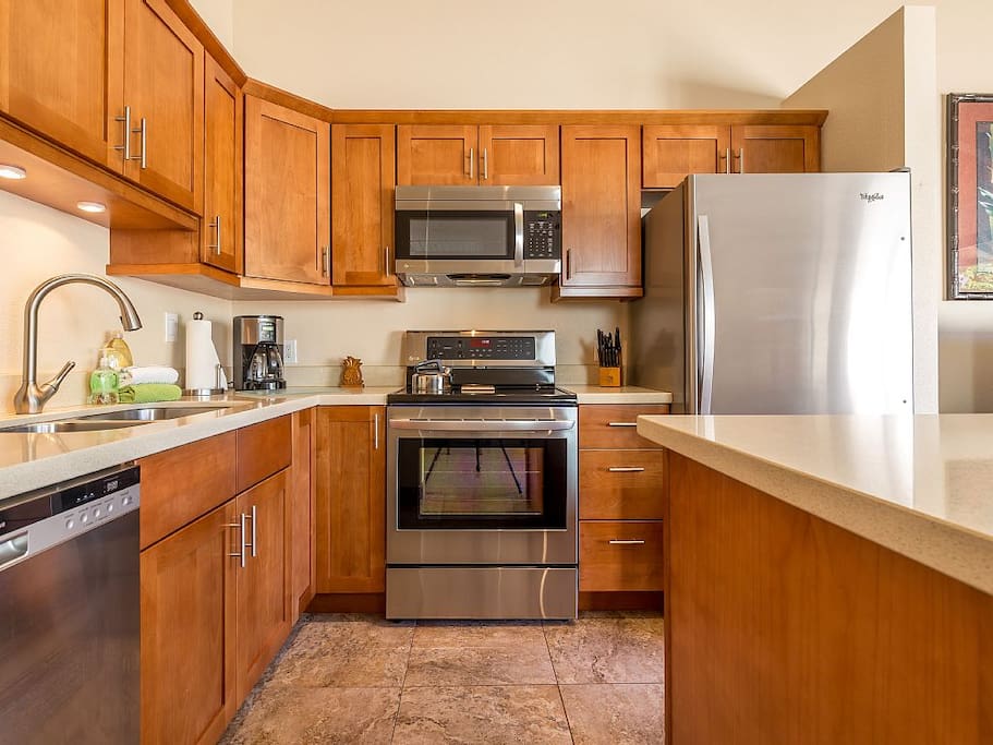 Well Equipped Kitchen With Stainless Steel Appliances