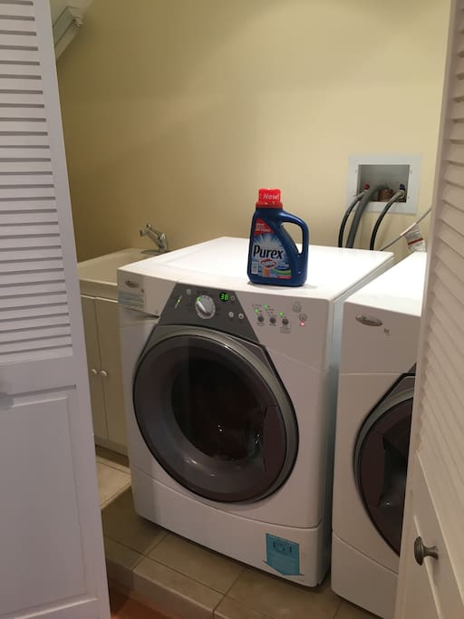 In unit private laundry with closing doors