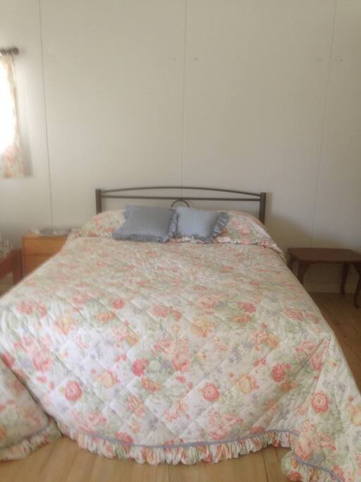 Queen bed room is temperature controlled with ceiling fan
