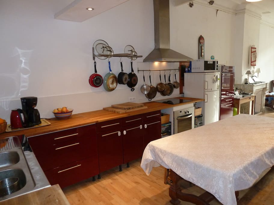 Our newly-renovated kitchen gives a large space to make and enjoy meals, and has opened up the kitchen into the living room