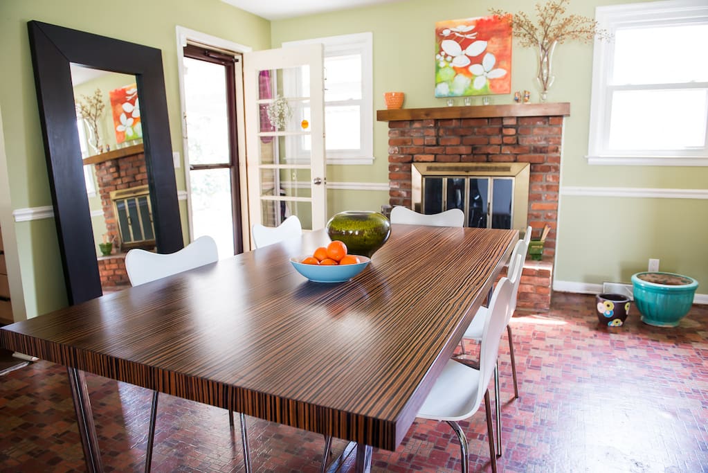 Dining room with wood-burning fireplace.