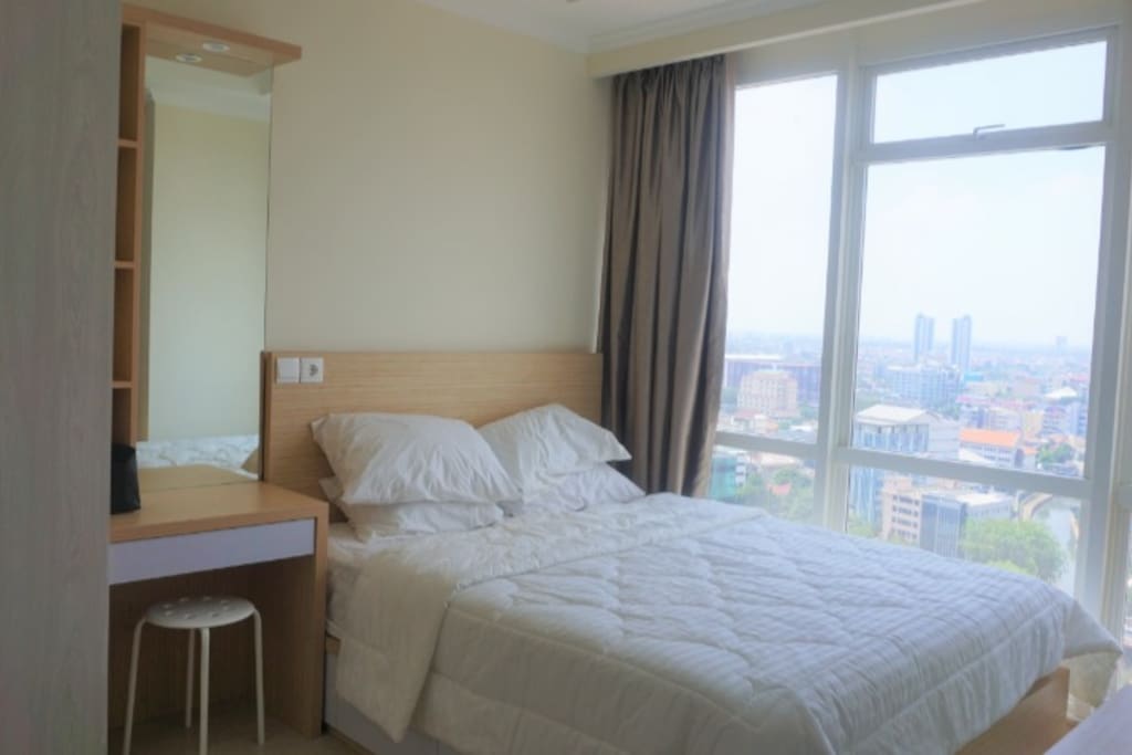You have a very comfy bed to sleep on after a busy day in Jakarta
