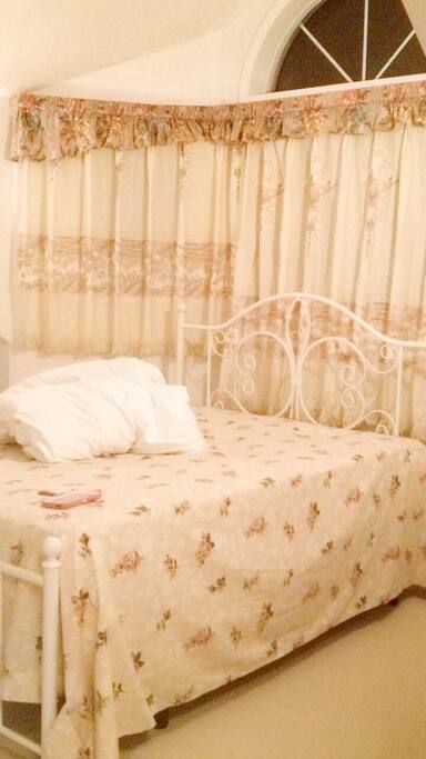 Bedroom with certain drawn. Quality room, quality amenities and quality colour.