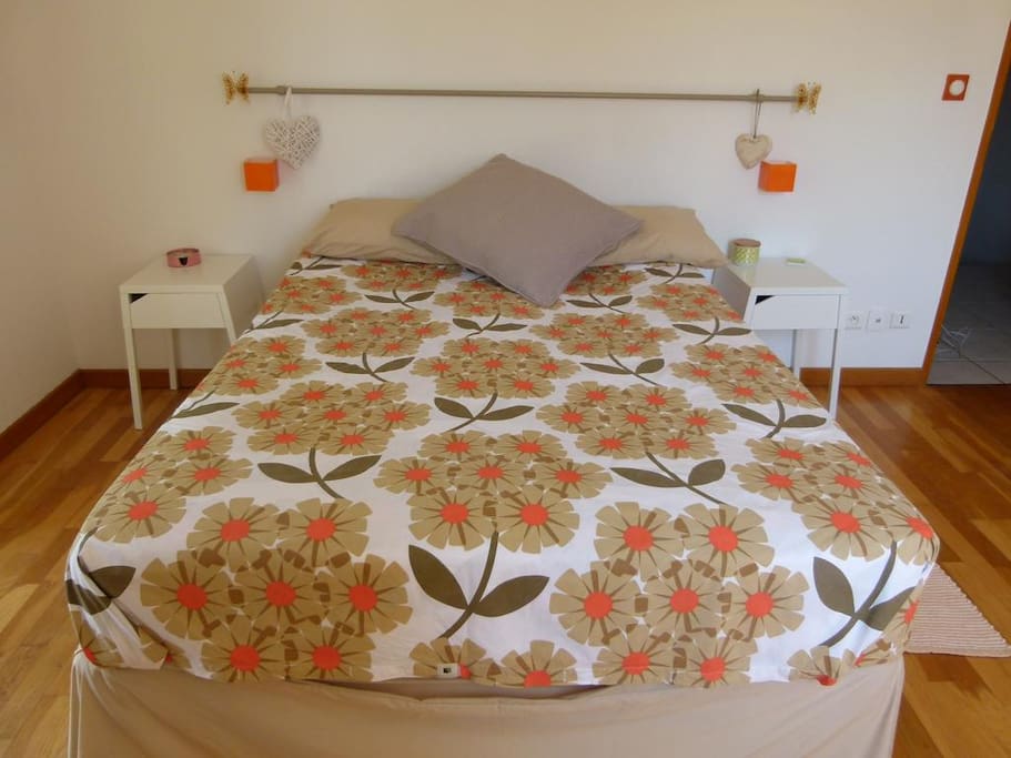 This is the main bedroom, with double bed, views overlooking garden and swimming pool