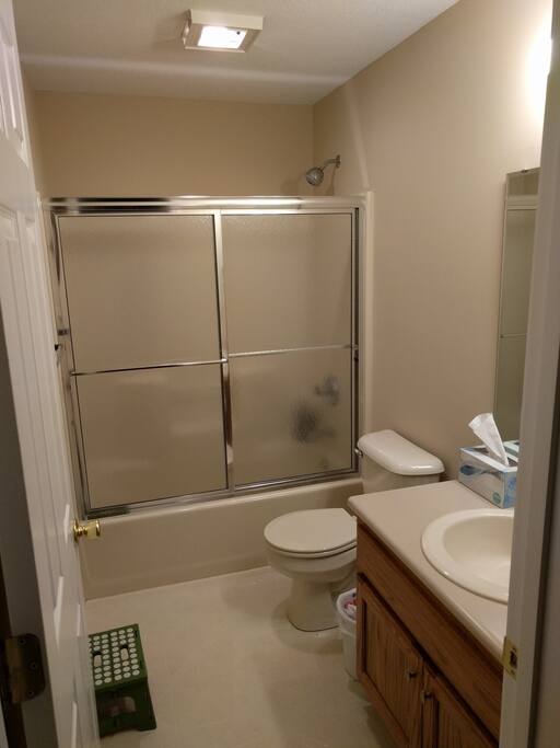 Full private guest bath, adjacent to guest room.