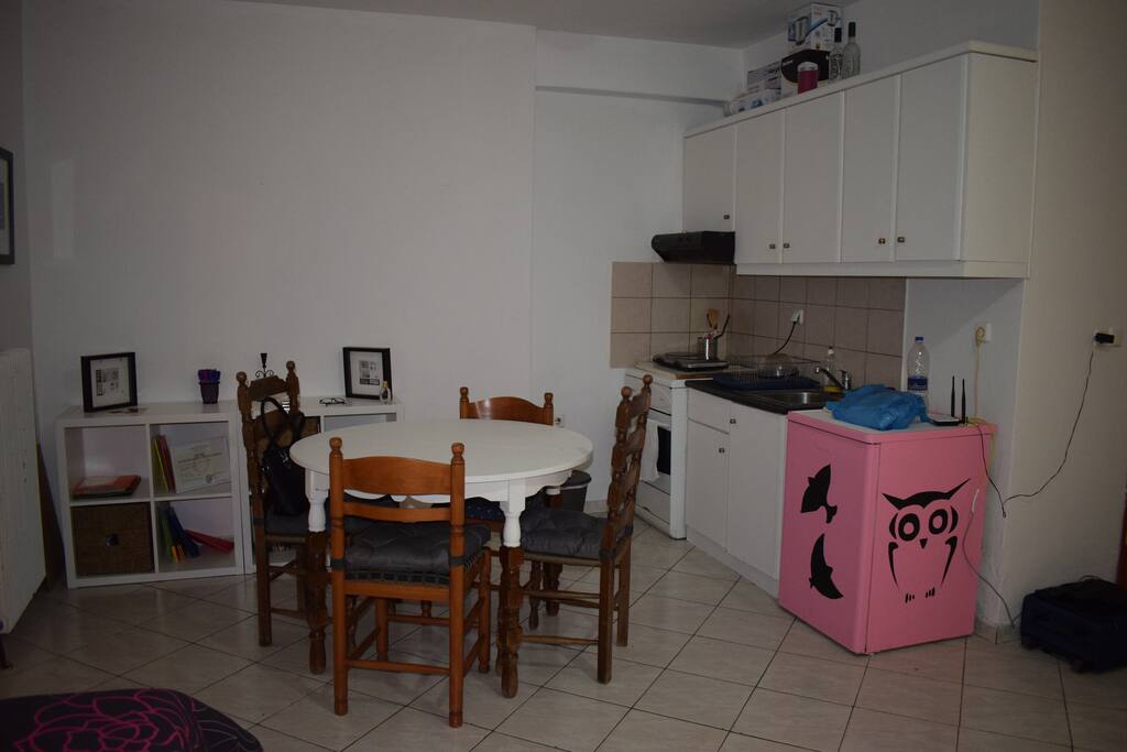 Kitchen - cooker, fridge and cockery