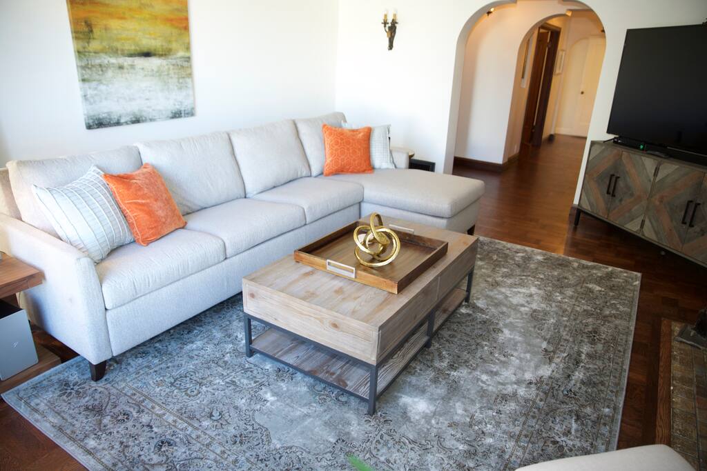 Living Room - Sofa is a King Size fold out American Leather Bed 3" Memory Foam Mattress - Extremely comfy!