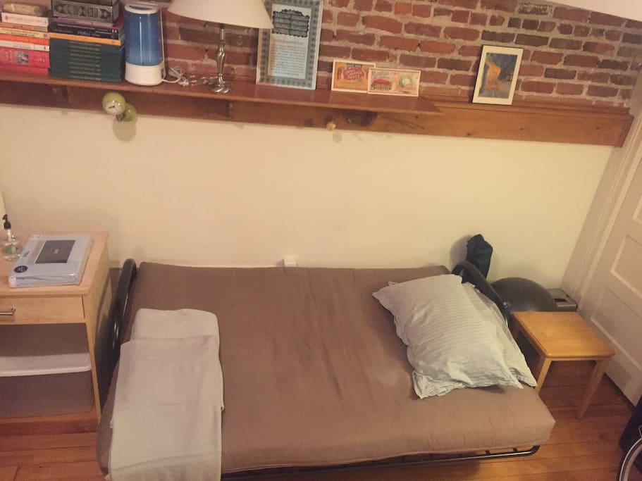 Fold out Futon. Bedding included.