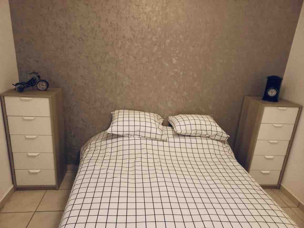 Bedroom with double bed and 2 storage cabinet