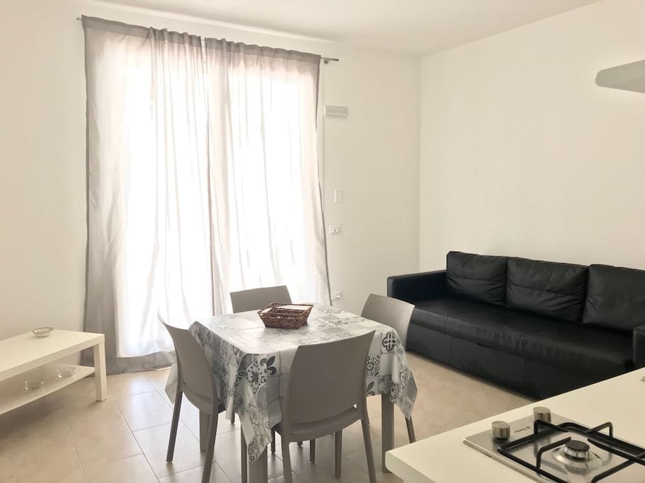 Cucina-soggiorno con divano letto