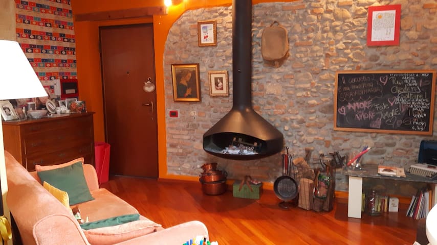 Mansarda con travi a vista