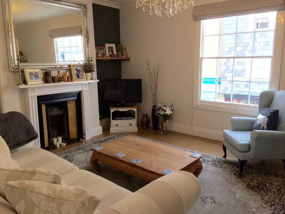 Sitting room with views of the High Street.