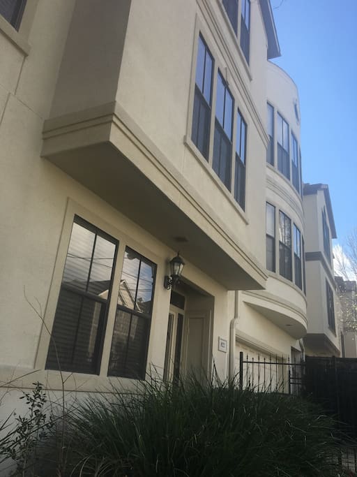 Home has huge Windows throughout w/custom wood blinds.