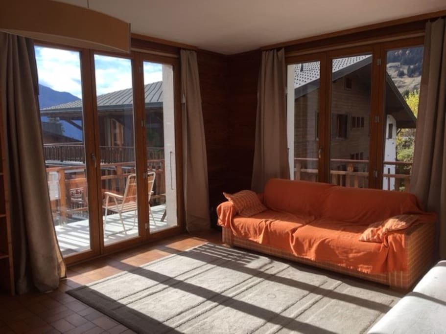 Living room with French doors to balconies