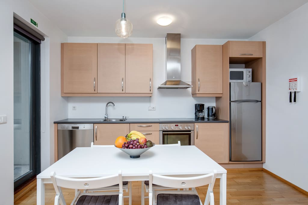 The kitchen is fully equipped and there is a small balcony.