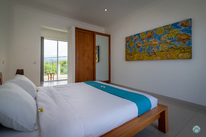 One of the four bedrooms in Villa 2