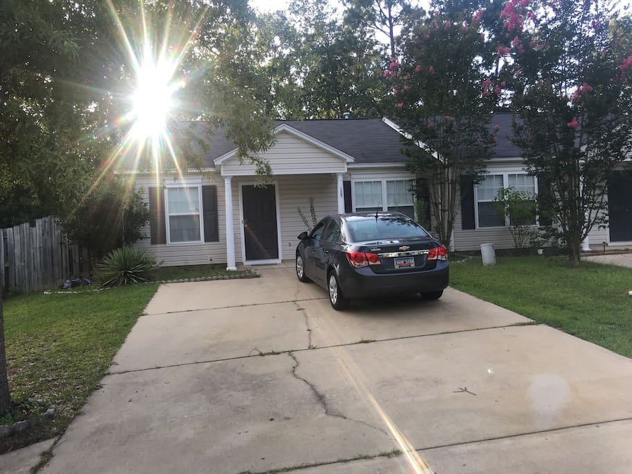 Front of house with 2 car (up to 4) driveway