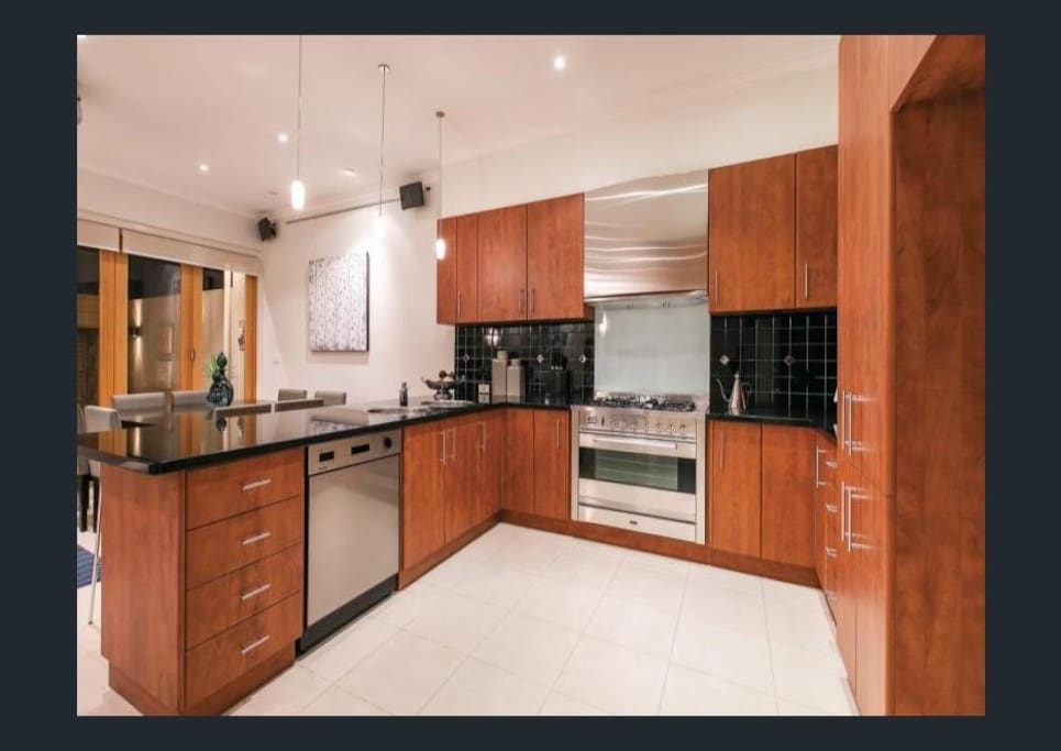 Kitchen, gas stove, coffee maker, dishwasher