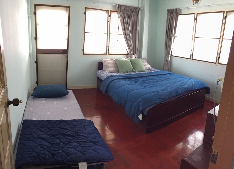 Room 2 has a balcony and extra bed.