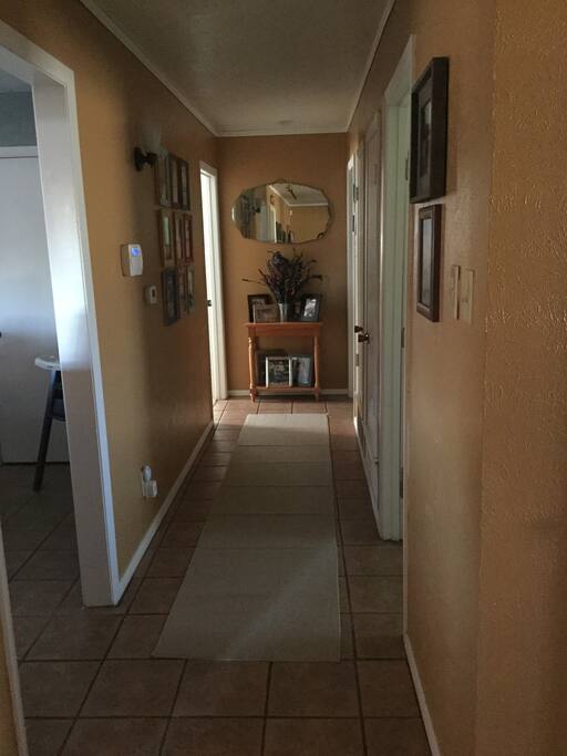 Hallway to guest rooms, Queen room on the left and another twin room available on the right.