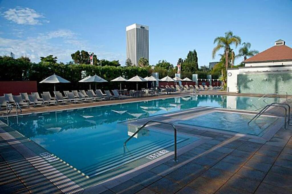 Swimming pools with hot tub.