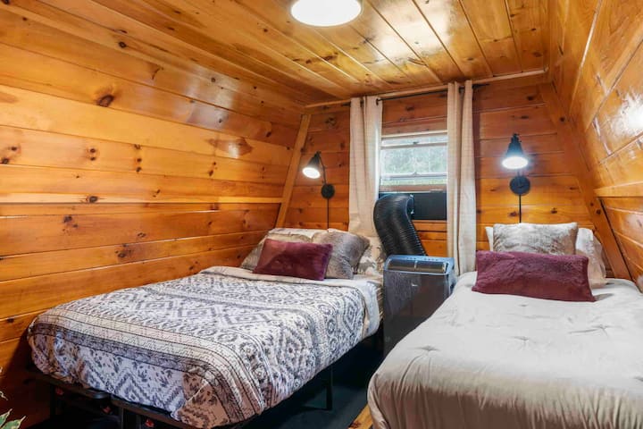 The second bedroom offers 1 full bed and 1 twin bed. This room is directly connected to the Primary Bedroom. 