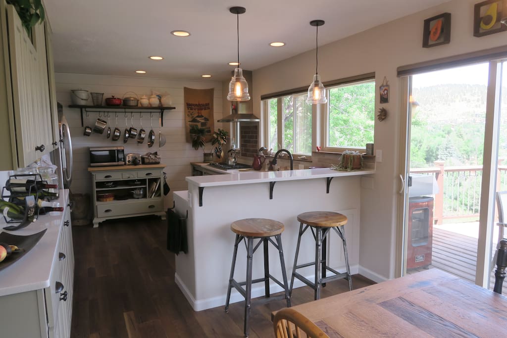 Fully-equipped kitchen with bar seating