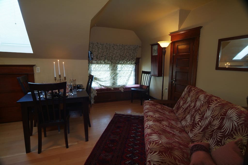 This is our third floor kitchen with futon and table, for third floor guests