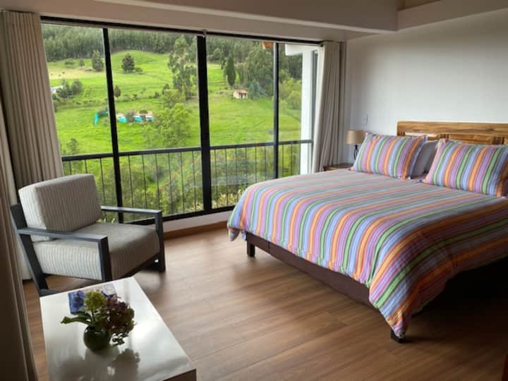 Chumba cha kulala chenye kitanda cha ukubwa wa malkia