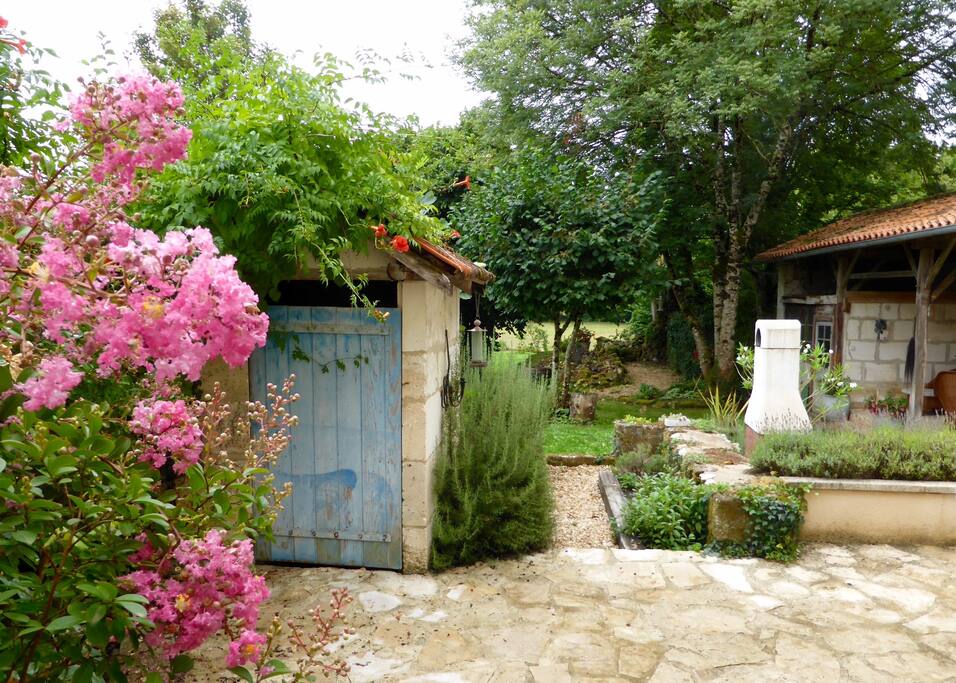 The private garden with steps down into the sheep meadows of Chateau de Villars and an easy walk through the grounds to the Chateau's heated pool.