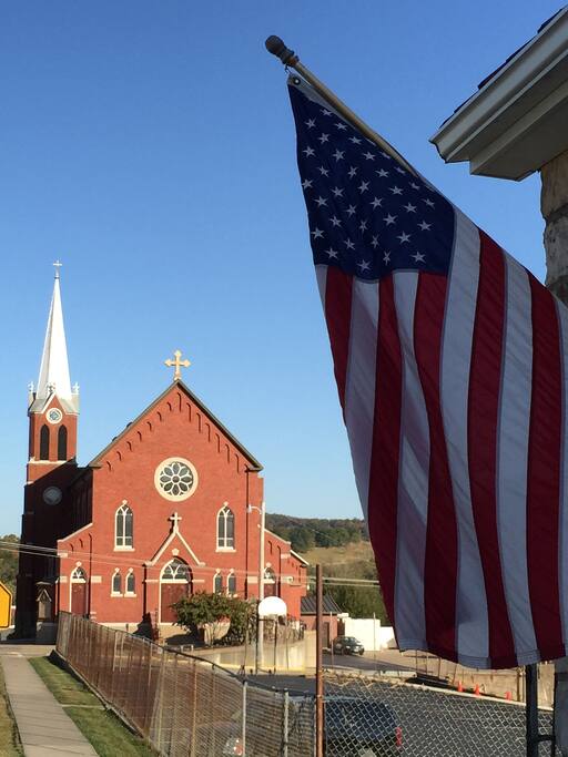 Right next to St. George Catholic Church.