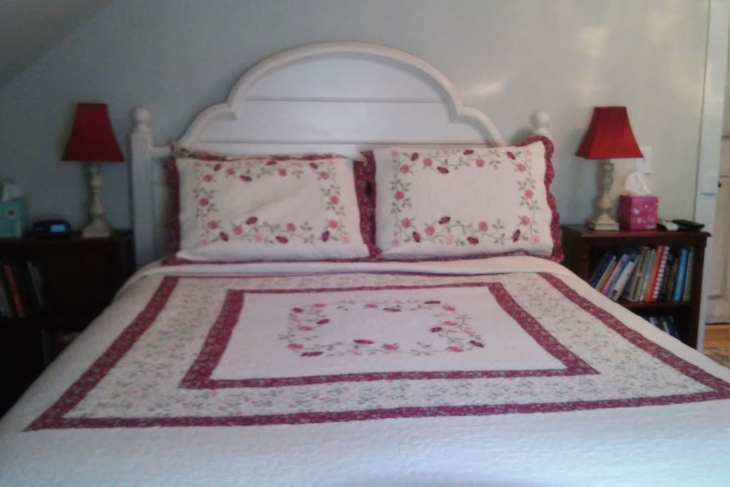 For a good night's rest, a comfortable, queen-size bed with new mattress awaits...