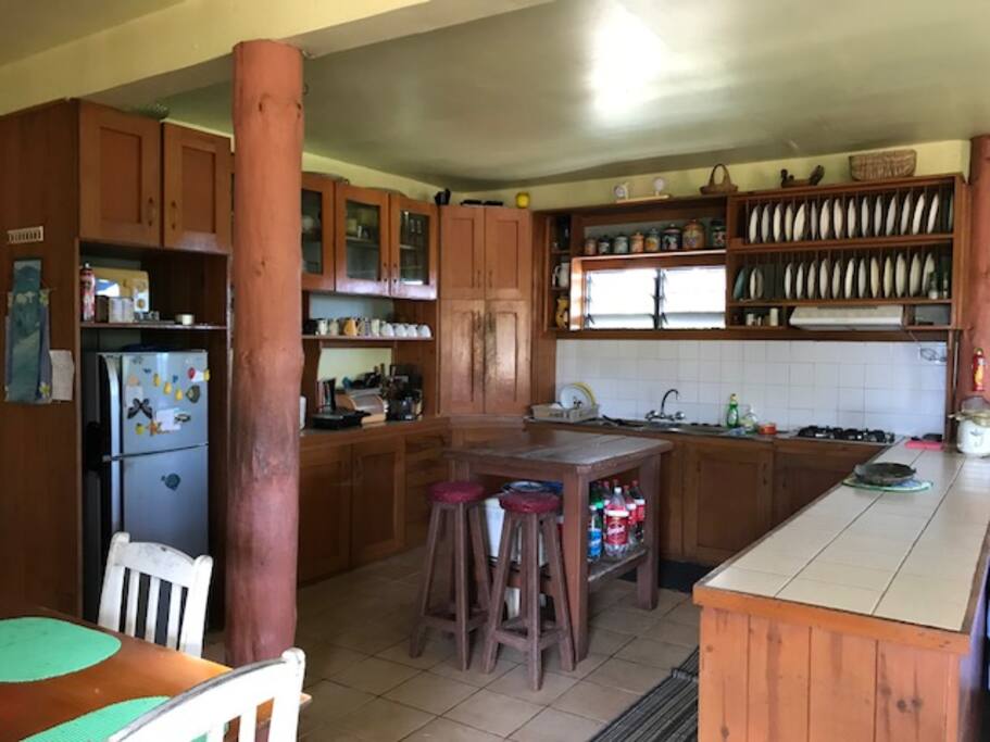 Fully stocked kitchen and dining area.