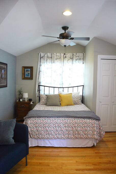 A queen sized memory foam bed is waiting for you, or you and a guest!