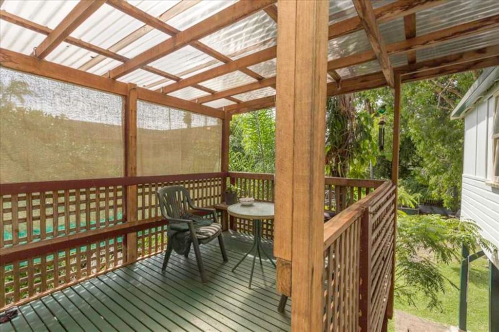 Large backyard and deck for the smokers