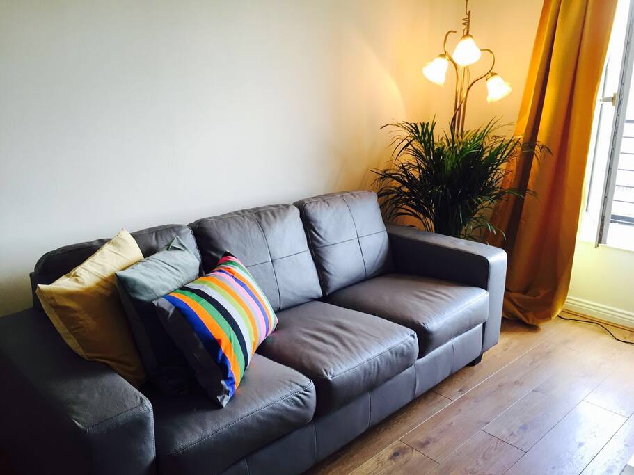 The living room is light and airy with magnificent view right on to St Werburghs Church, a Georgian gem.