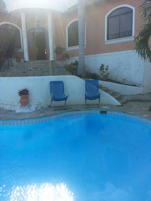 Take a dip in the pool while you sunbath
