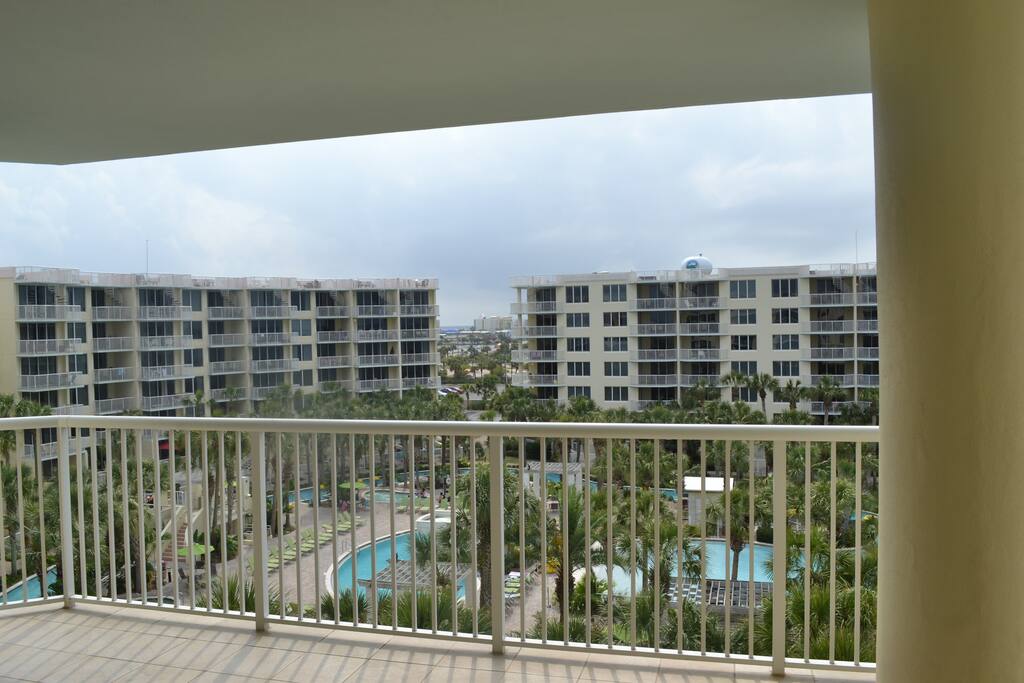 Balcony View - this is what you'll enjoy every day! Lazy River, hot tubs and pools.