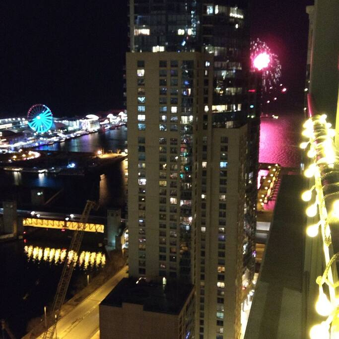 East view off the balcony of Navy Pier, the Ferris wheel and the weekly fireworks