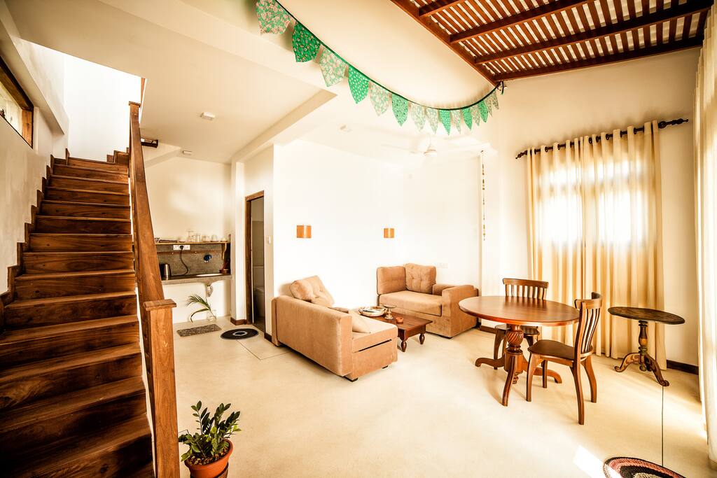 Entire apartment with kitchen, lounge room, and upstairs bedroom