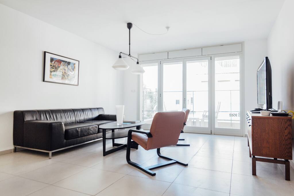 Large and spaces living room with a balcony facing Shabazi street .
