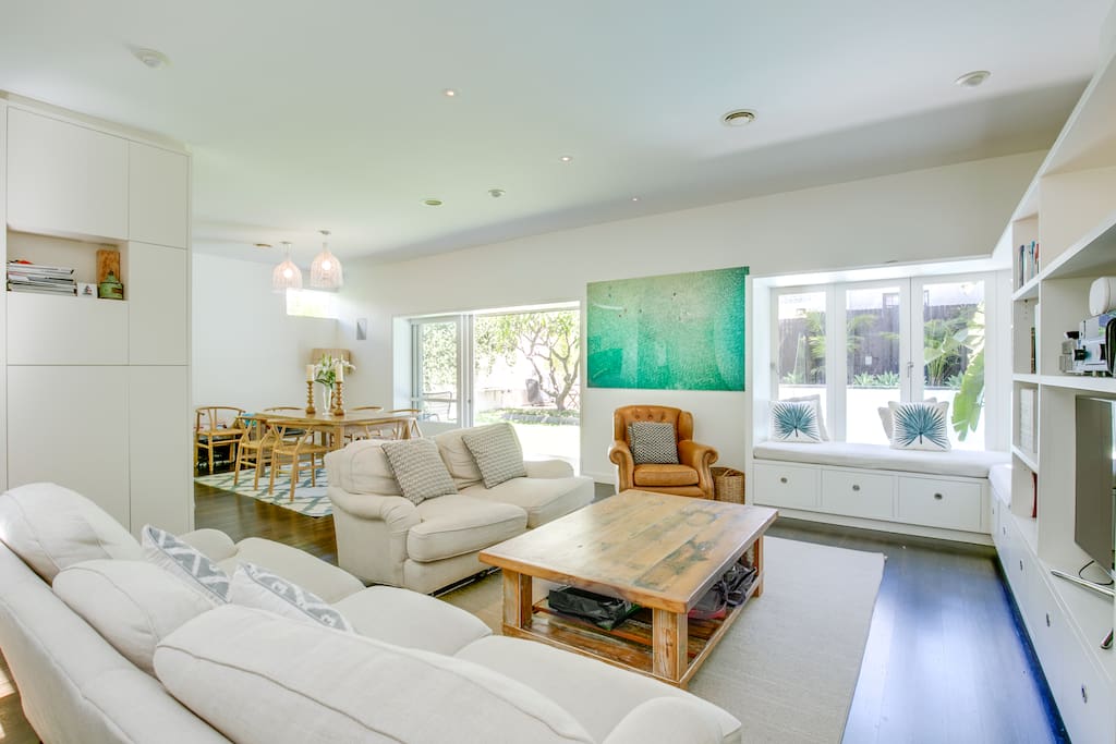 Spacious living area opening to pool and garden